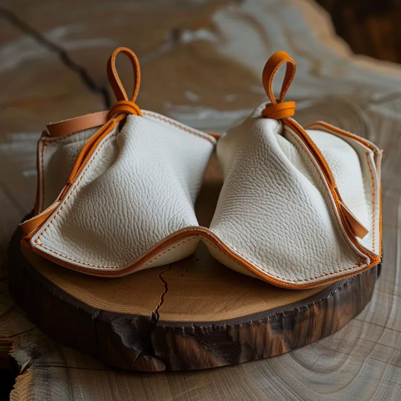 သားရေလက်ဝတ်ရတနာအိတ်ကိုအသုံးပြုခြင်း၏အကျိုးကျေးဇူးများကားအဘယ်နည်း။